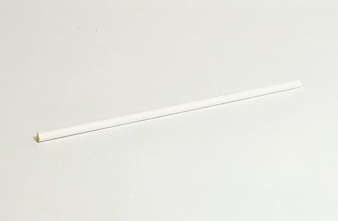 Long, white paper straw on a light gray background