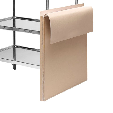 Beige paper table cover on a metal shelf with a white background