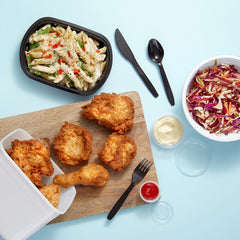 Bonson solutions product range shown with chicken nibbles, coleslaw & pasta salad.
