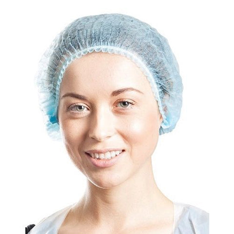 Person wearing a blue hairnet on a white background