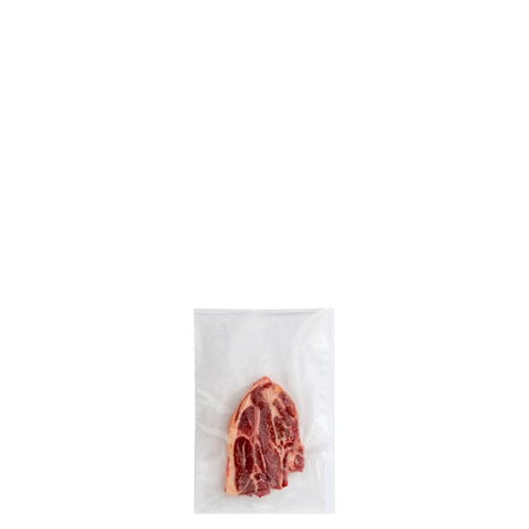 Meat in a vacuum seal bag on a white background