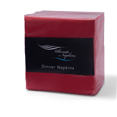 Pack of red dinner napkins on a white background