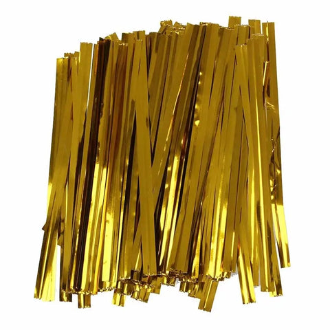 Gold Plastic Twist Ties on a white background