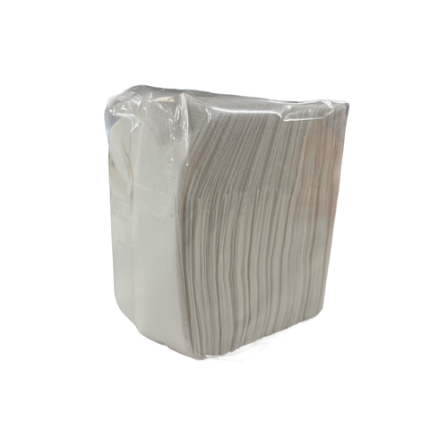 Pack of white Compact Fold Dispenser Napkins in clear plastic packaging on a white background