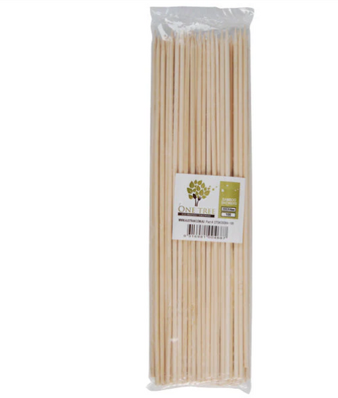 Pack of wooden skewers with a label on a white background