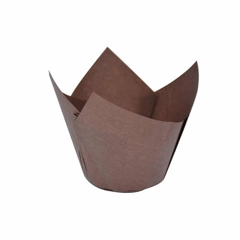 Brown paper tulip muffin cup on a white background