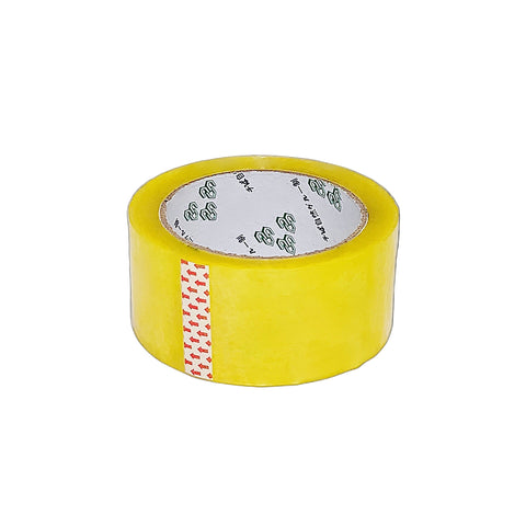 Yellow packing tape roll on a white background