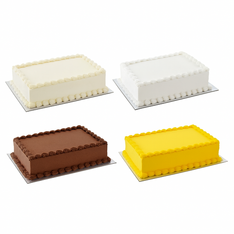 Four rectangular cakes in different colors on silver cake boards against a white background