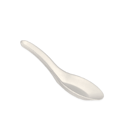 A disposable sugarcane soup spoon on a plain background.