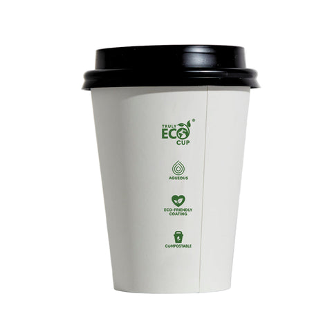White paper cup with black lid featuring eco-friendly labels on a white background