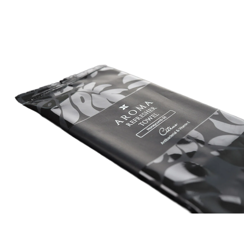 Aroma refresher towel packaging with floral design on a white background