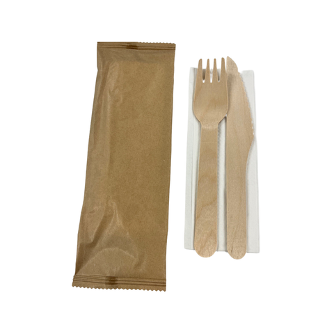 Fork + knife + napkin set in brown paper packaging on a white background