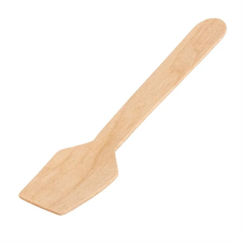 Wooden ice cream spatula on a white background